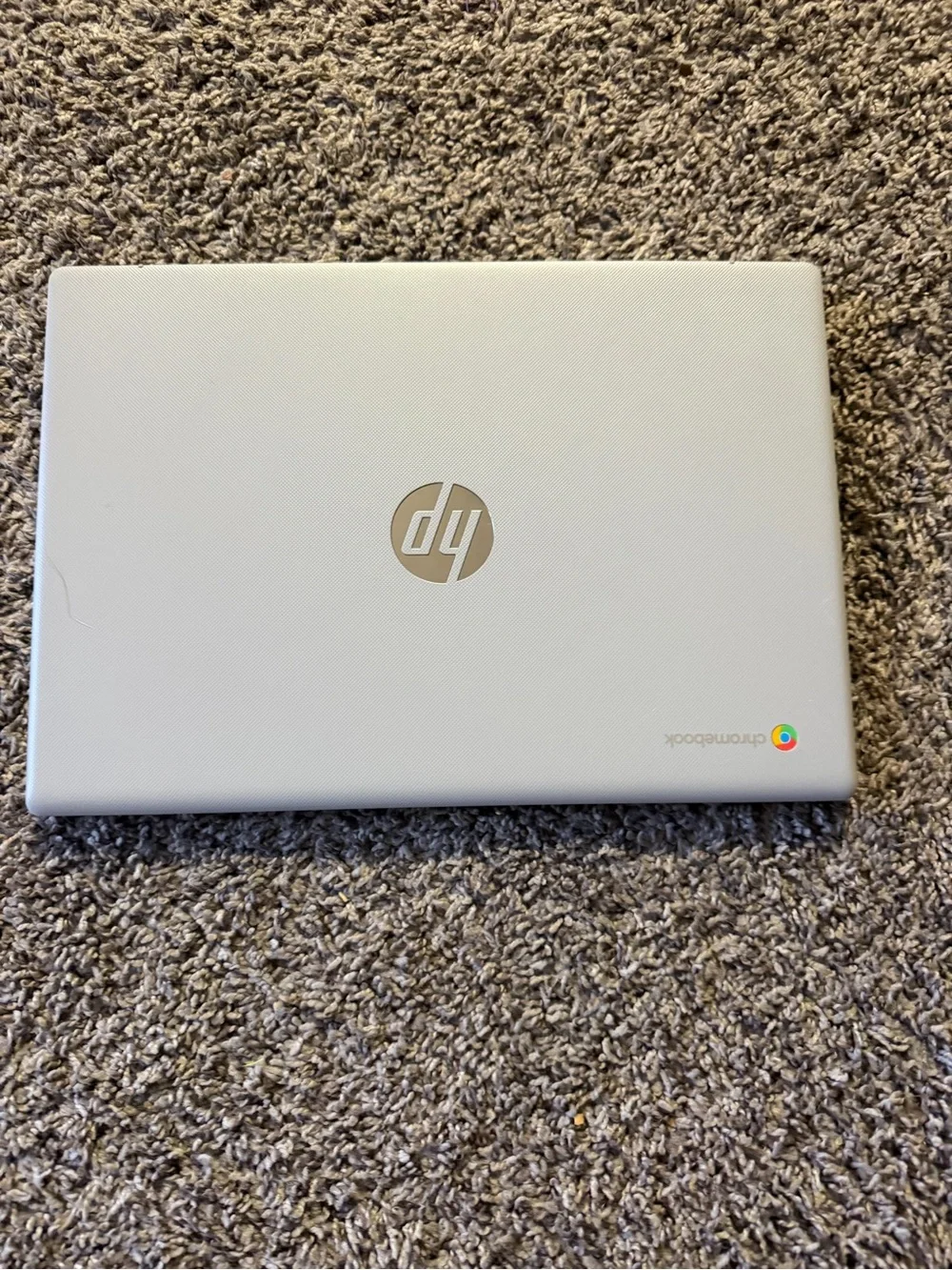 HP Chromebook Laptop in Silver with Chrome Logo